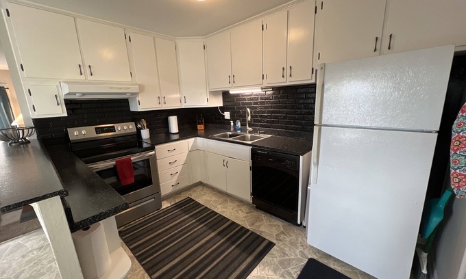 Cedar Rapids - Iowa City House | Trendy Rockwell House in Cedar Rapids: Pet-Friendly Retreat