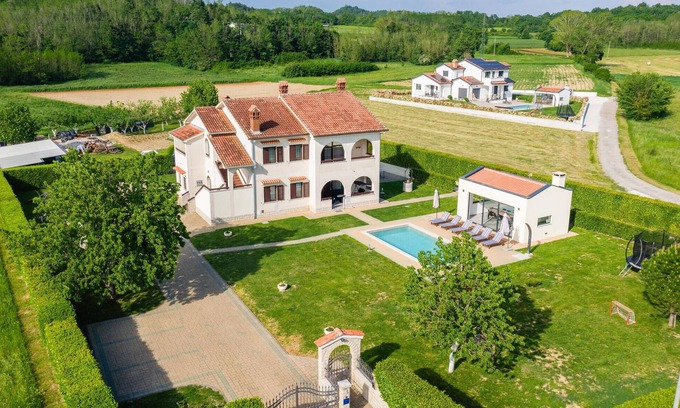 Skropeti House | Inviting 5-Bedroom Getaway in Karojba with Private Pool