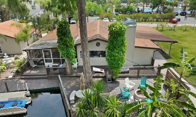 Weeki Wachee Gardens House | Top-Rated Retreat with Kayaks, Firepit & Ocean Views