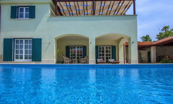 Butkovici Villa | Elegant Villa with Heated Pool, Tennis Courts & Ocean Views