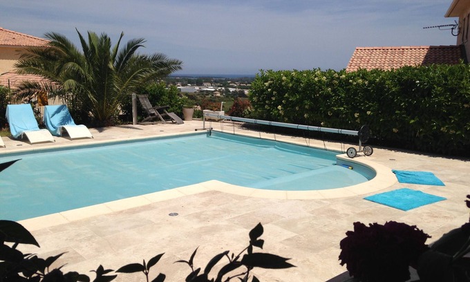 Biguglia Villa | Inviting Villa with Pool and Ocean View, 5 Min to Beach