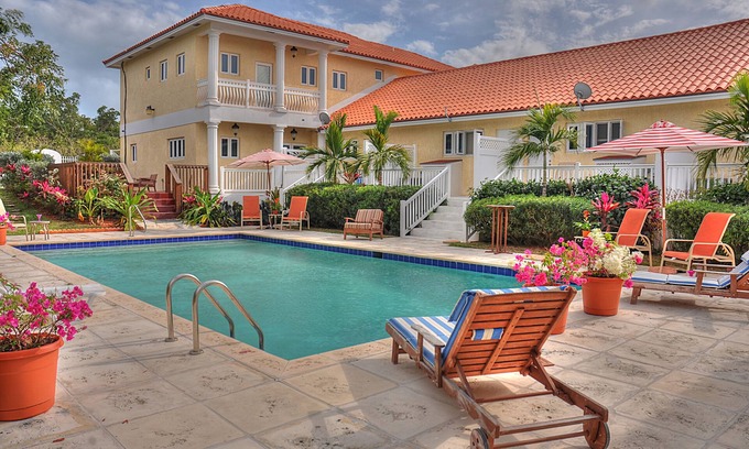 Nassau House | Elegant Suites and Pool Oasis with Oceanfront Views