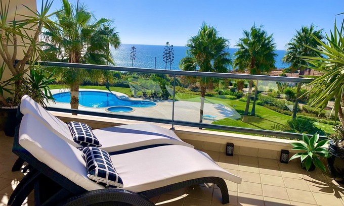 Porto de Mos Apartment | Ocean View Beachside Apartment with Pools & Spa Facilities