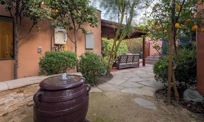 Pico - Robertson Cottage | Elegant Urban Retreat with Gourmet Kitchen & Serene Fountains