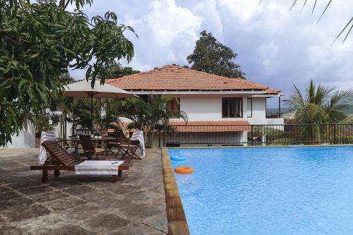 Britona Villa | Elegant 4-BR Tropical Woods Villa with Private Pool in Goa