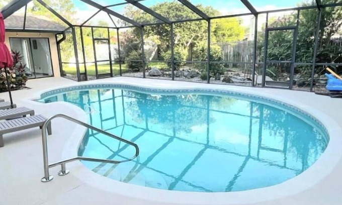 Greater Northdale House | Ideal Tampa Retreat: Pool, Grill & Billiards Await You
