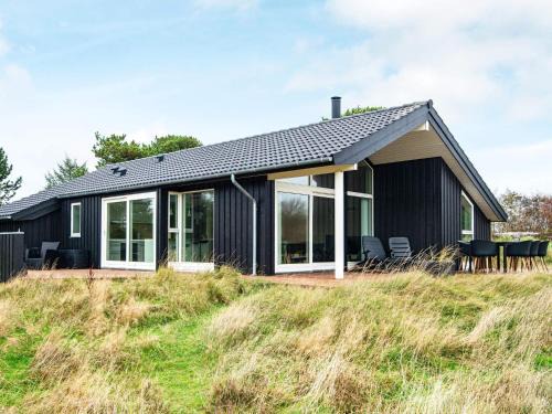 Rindby Strand House | Ideal 6-Person Holiday Home in Fan with Hot Tub & Fireplace