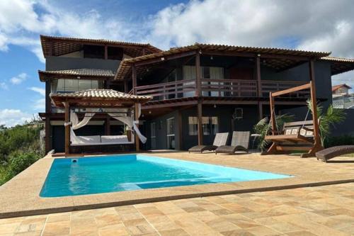 Sao Pedro da Aldeia Apartment | Relaxing Suites with Pool & Fireplace in Região dos Lagos