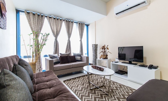 Salcedo Village Apartment | Comfortable 1 B/R Oasis @ Two Central with Pool & Spa