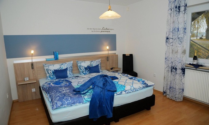 Absberg Apartment | Spacious Ground Floor Retreat with Balcony and Lake Views
