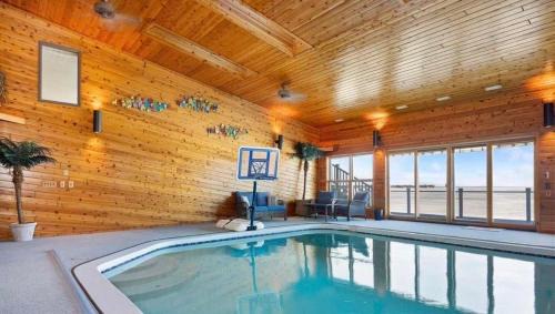 Prudenville House | Beautiful Houghton Lake House with Pool and Hot Tub