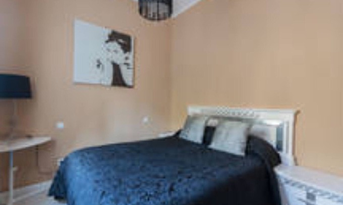 Atocha House | Convenient Stay with WiFi, A/C & Patio Near Metro