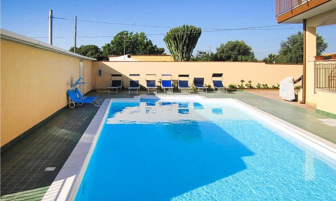 Syracuse House | Inviting Home in Siracusa with Full Kitchen & Pool Access