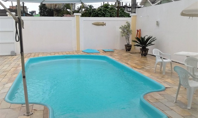 Guaratuba House | Exquisite 8 Bedroom House with Pool Steps from the Beach