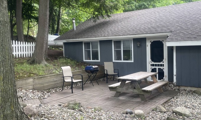 Ludington Cottage | Cozy Cottage on Hamlin Lake with Boat Docks and Spa