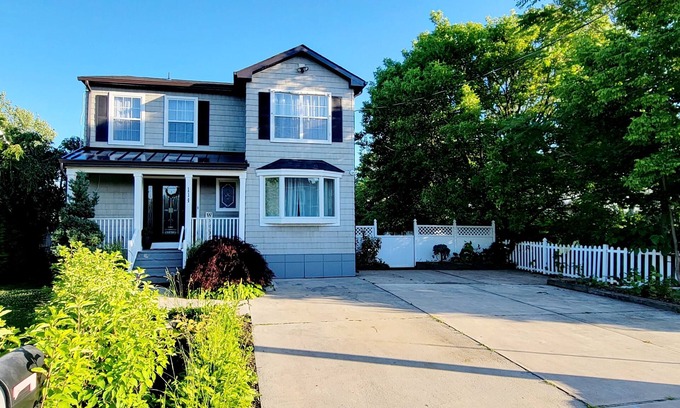 Long Branch House | Family-Friendly Oasis: Steps to Beach with Free Passes