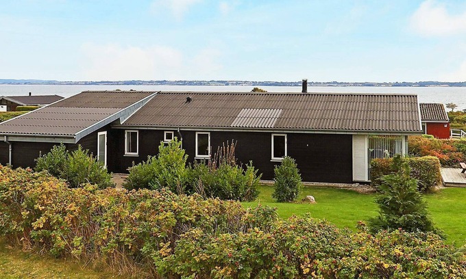 Helnæs By House | Ideal 8-Person Holiday Home with Ocean Views in Ebberup
