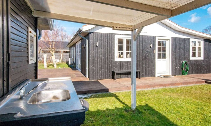 Grena Strand House | Spacious 8-Person Holiday Home with Oceanfront Views