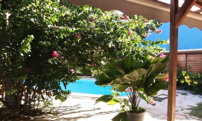 Saint-Charles Apartment | Gîte Sud-Ô-Naturel: Pool View Retreat with Oceanfront Charm