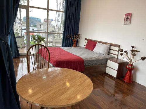 Nhat Tan Apartment | Inviting Green Balcony with Natural Light – 4-Star Retreat