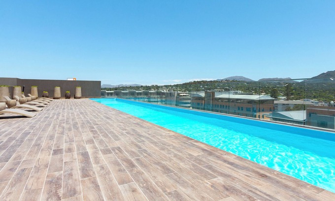 Claremont Apartment | Discover Newlands Peak Penthouse with Pool & Spa Access