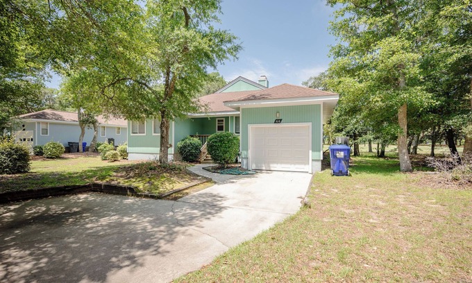 Caswell Beach House | Relaxing Patio Home with Ocean View Near the Beach