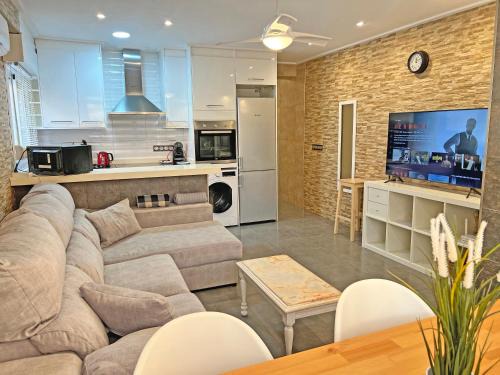 Santa Pola Apartment | Discover Beachfront Bliss: Free Parking & Ocean Views