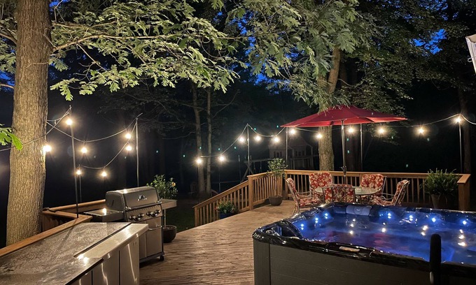 Waupaca House | Modern Retreat with Hot Tub by Wooded River - Rated 9.4/10