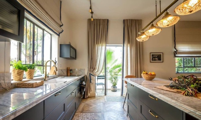 Tel Aviv Apartment | Charming Chalet Apartment Near Rothschild Boulevard Awaits