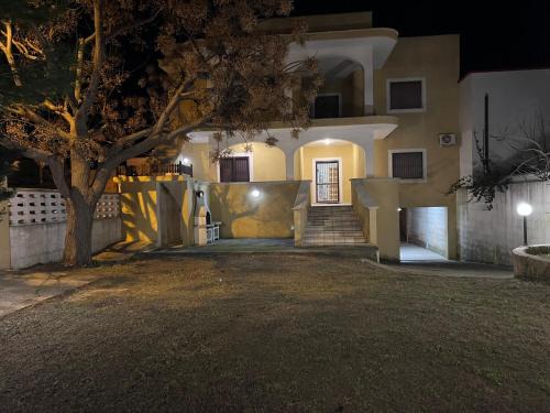 San Pietro in Bevagna Villa | Steps from the Sea: Family-Friendly Retreat with 10/10 Rating