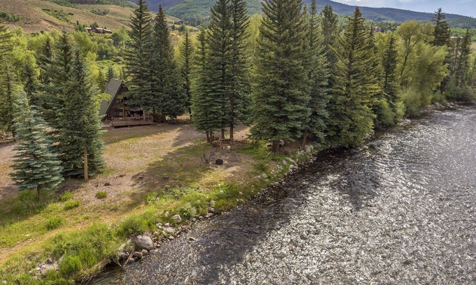 South Forty Cabin | Inviting A-Frame Cabin by the Blue River with Deck & Fishing