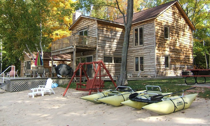 Traverse City Cottage | Idyllic Lakeside Retreat with Private Beach & Pet Friendly