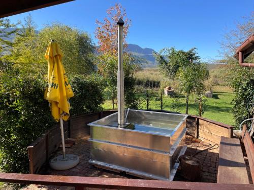 Swellendam House | Cozy Log Home at Buffalo Creek with Hot Tub & Family Fun