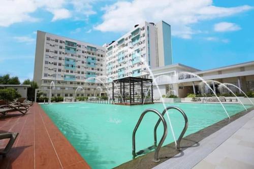 Dumaguete Apartment | Oceanfront 2BR Retreat with Pool and Balcony Access