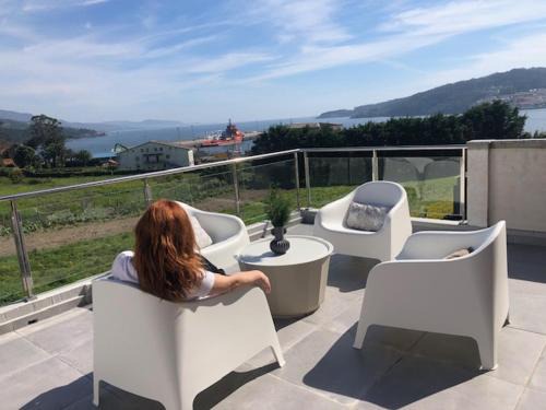 Cee House | Neida Casa: Oceanfront Retreat with Scenic Terrace Views
