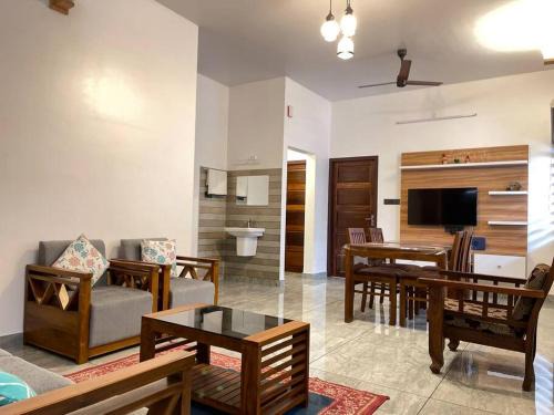 Kochi Villa | Budget-Friendly A-One Suites with Family Amenities Await