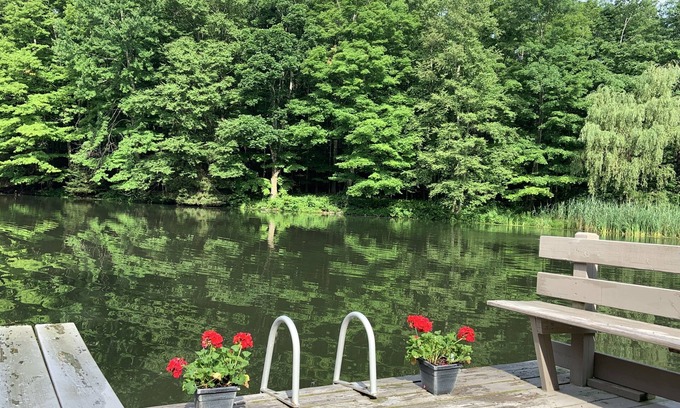 Holmes House | Idyllic Waterfront Retreat with Pool & Lake Views Await