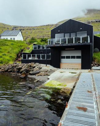 Faroe Islands Villa | Elegant Boathouse Retreat in a Secluded Fjord - 4 Star Stay