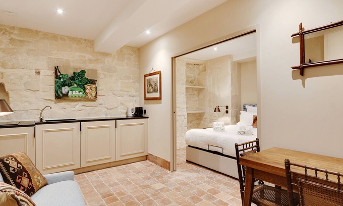 Saint-Thomas-d'Aquin Apartment | Charming 1-BR Retreat with Spa in Saint-Germain