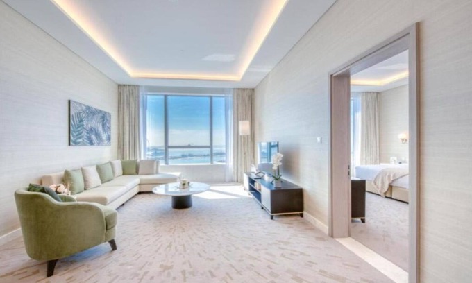 Deira Apartment | Seaside Retreat: 1BR with St Regis Amenities Await You