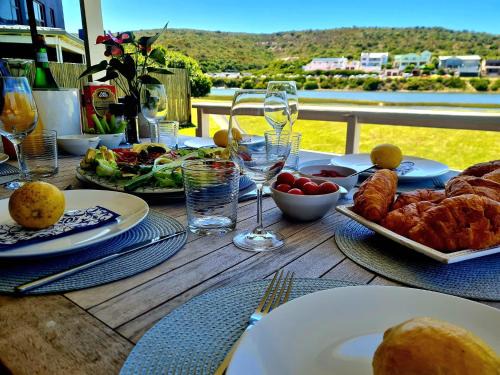 Still Bay House | Charming Riverfront Escape: A Rickety River House Awaits