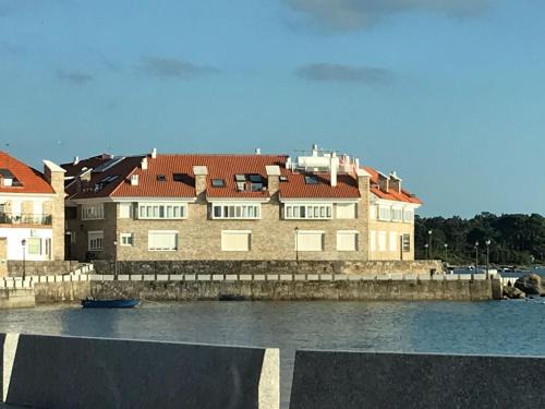 Isla de Arosa Apartment | Oceanfront A Salga: Guest Rated 9.7 with Stunning Views