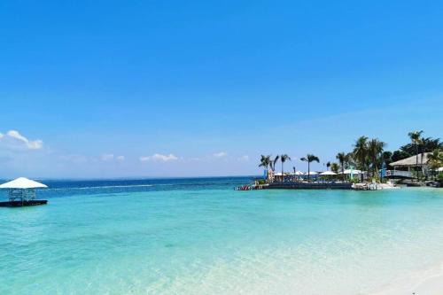 Davao House | Oceanfront 3-Bedroom Beach Home with Pool and Restaurant