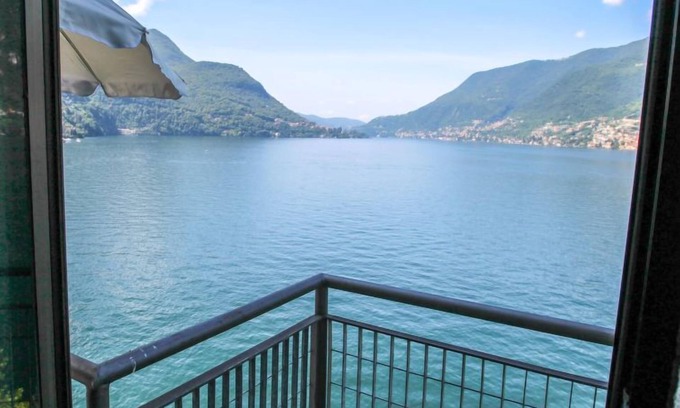 Faggeto Lario Apartment | Superior Comfort at Interhome: Oceanfront Escape Awaits