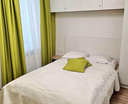 Grizinkalns Apartment | Discover A Touch of Olive: Guest Rated 8/10 Experience