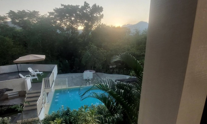 Puerto Princesa Apartment | Enchanting Pink Secret Garden Resort with Pool & Breakfast
