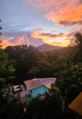Puerto Princesa Apartment | Discover A Touch of Pink: Oceanfront Garden Retreat