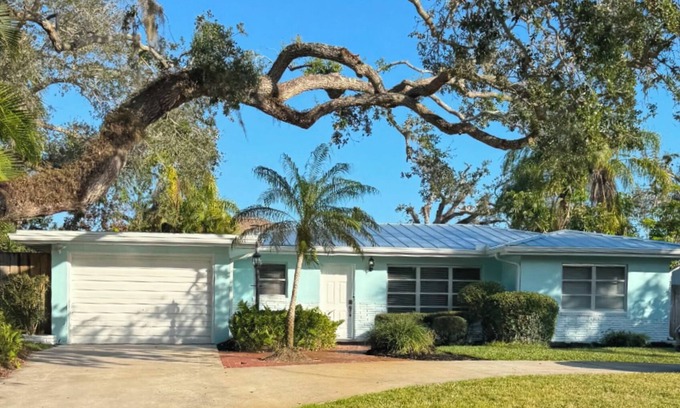 Central Beach House | Tropical Retro Bungalow with Heated Pool & Ocean Views