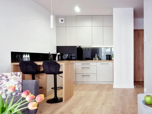 Koszalin Apartment | Top-Rated A&W Apartament Franciszkańska: Family-Friendly Escape