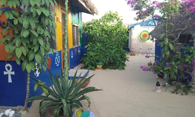 Keta Cabin | Experience A&Y Wild Camp Ghana: Beachfront Bliss Awaits